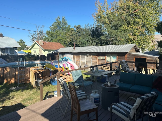 deck with outdoor lounge area