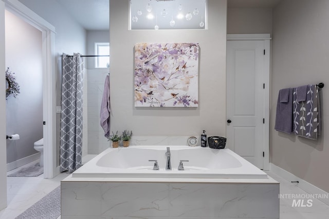 bathroom featuring a bath, marble finish floor, curtained shower, and toilet