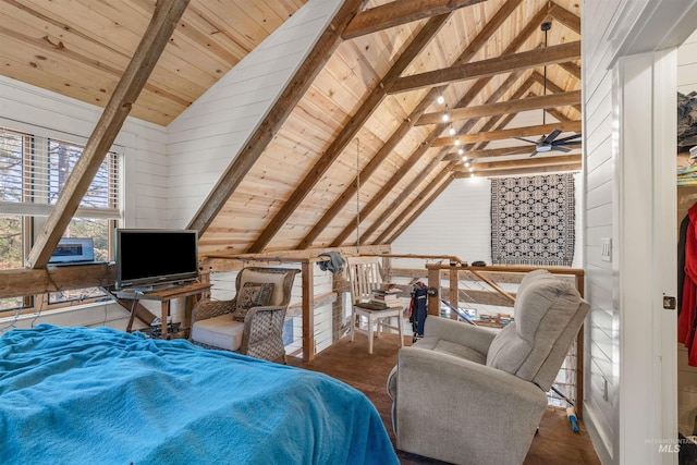 bedroom with wood walls, lofted ceiling with beams, and wooden ceiling