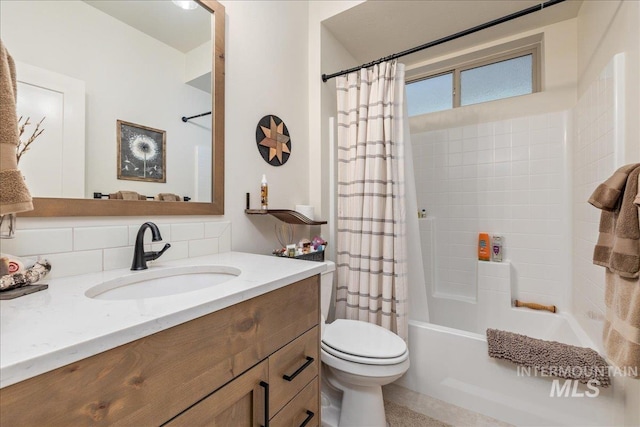 full bathroom with toilet, decorative backsplash, vanity, and shower / bath combination with curtain