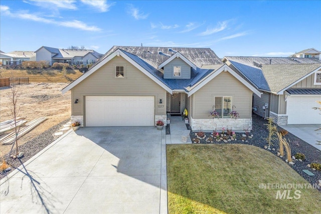 view of front of house with a front lawn and a garage