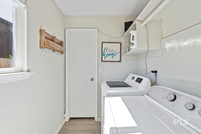 1722 W Mcglinchey St, Meridian, ID 83646 - laundry area with independent washer and dryer and light wood finished floors