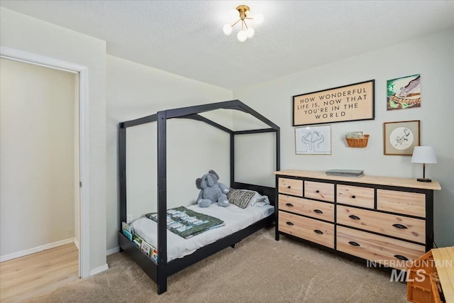 1722 W Mcglinchey St, Meridian, ID 83646 - bedroom with light colored carpet and a textured ceiling