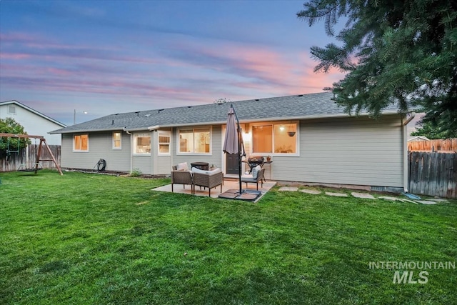1722 W Mcglinchey St, Meridian, ID 83646 - back of property with a patio area, a fenced backyard, a shingled roof, and outdoor lounge area