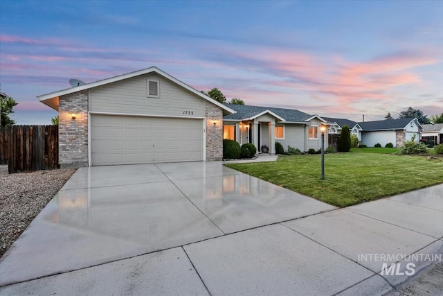 1722 W Mcglinchey St, Meridian, ID 83646 - ranch-style house featuring a garage, brick siding, and concrete driveway
