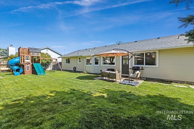 1722 W Mcglinchey St, Meridian, ID 83646 - view of green lawn featuring a playground and a patio