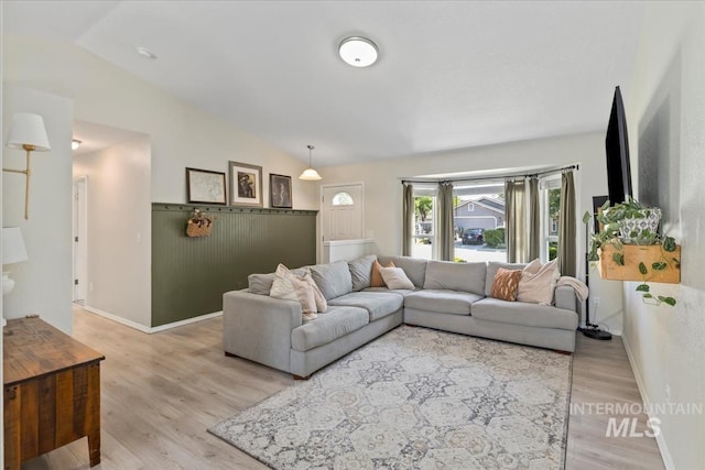 1722 W Mcglinchey St, Meridian, ID 83646 - living room with vaulted ceiling and light wood-style floors