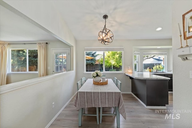 1722 W Mcglinchey St, Meridian, ID 83646 - dining space featuring light wood-type flooring and recessed lighting