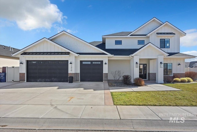 modern farmhouse style home with a standing seam roof, a garage, brick siding, concrete driveway, and board and batten siding