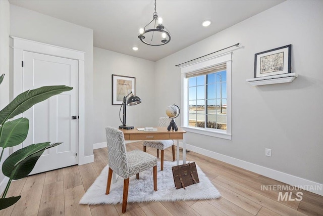 home office with a chandelier, recessed lighting, wood finished floors, and baseboards