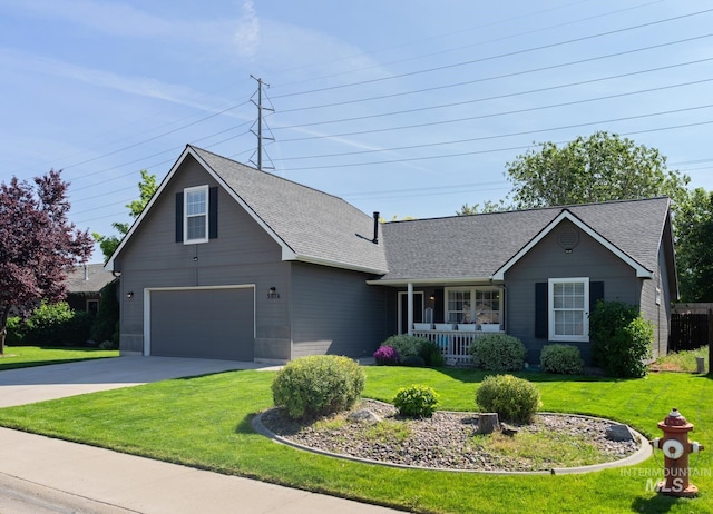5076 Staaten Pl, Boise, ID 83709 - view of front of property featuring covered porch, a front lawn, concrete driveway, and a shingled roof