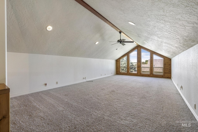 70 Pelican Dr, Rupert, ID 83350 - bonus room featuring a textured ceiling, lofted ceiling, carpet, baseboards, and a ceiling fan