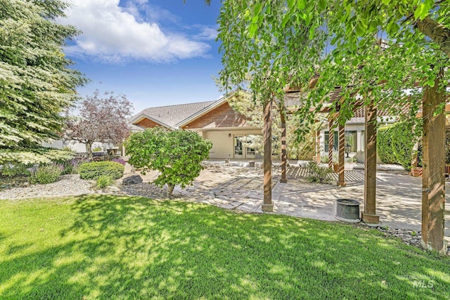 70 Pelican Dr, Rupert, ID 83350 - view of grassy yard with a patio area