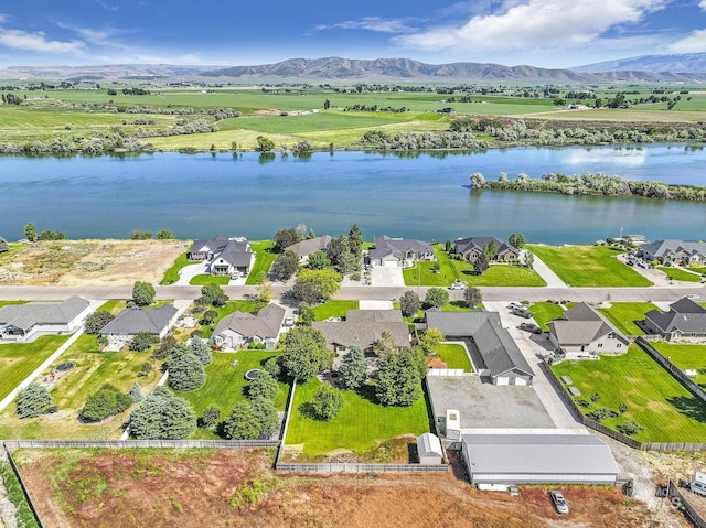 70 Pelican Dr, Rupert, ID 83350 - aerial view of residential area with a water and mountain view