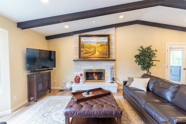 1205 Ponderosa Dr, Moscow, ID 83843 - living room featuring recessed lighting, light wood-type flooring, a stone fireplace, and baseboards