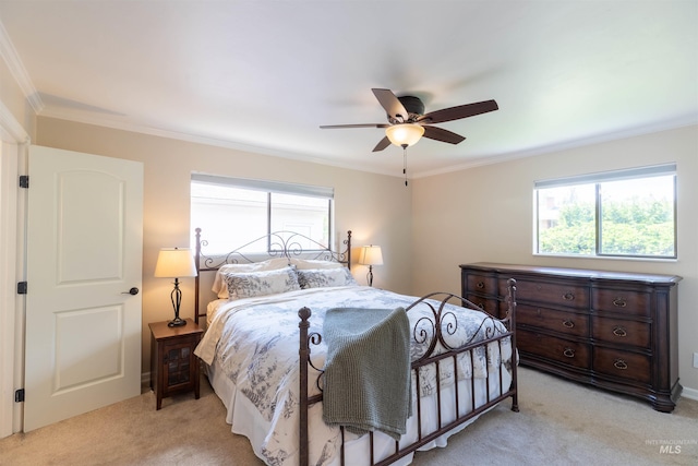 1205 Ponderosa Dr, Moscow, ID 83843 - bedroom with light colored carpet, crown molding, and a ceiling fan
