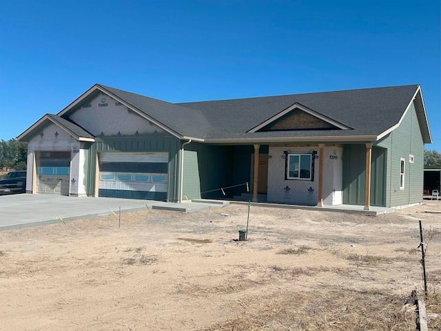 view of front of property with a garage