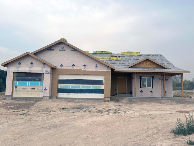 property under construction with a garage