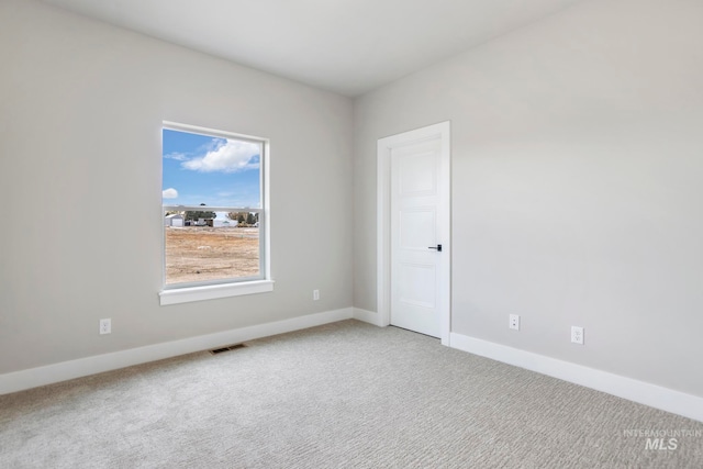 view of carpeted spare room