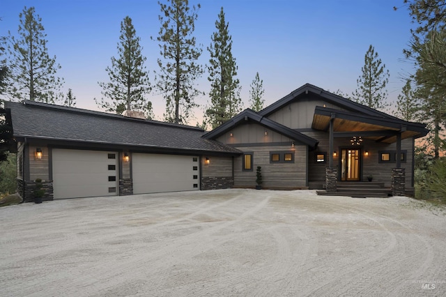 view of front of home with a garage and driveway