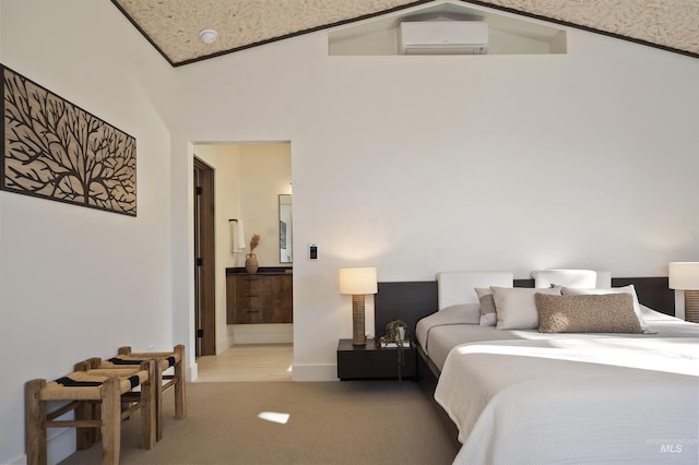 bedroom featuring light carpet, a high ceiling, and ensuite bathroom