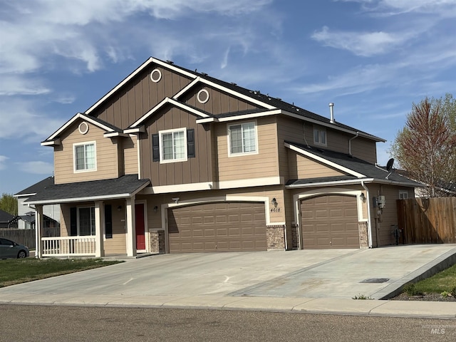 4618 Braeburn, Caldwell, ID 83607 - craftsman house featuring board and batten siding, a garage, covered porch, fence, and driveway