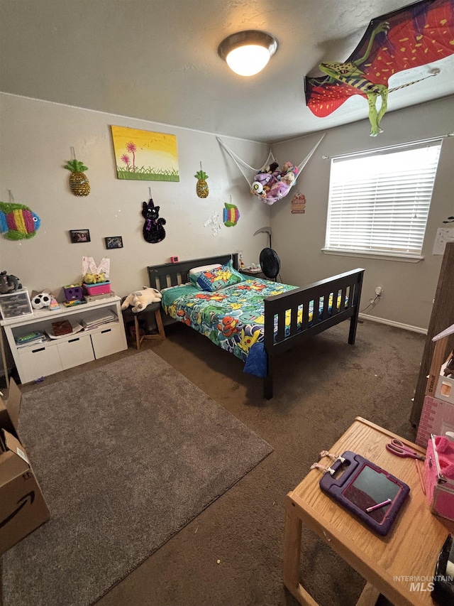 4618 Braeburn, Caldwell, ID 83607 - bedroom with baseboards and carpet flooring