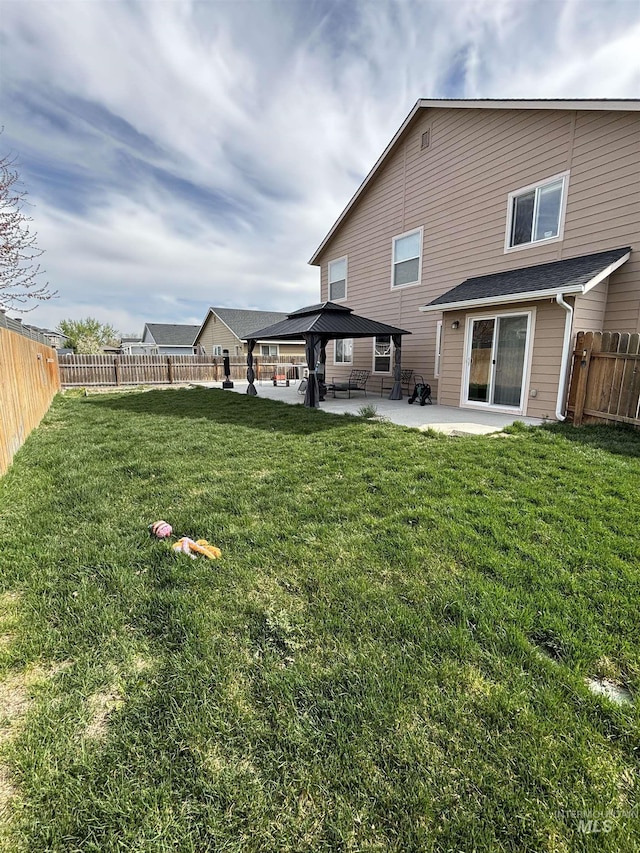 4618 Braeburn, Caldwell, ID 83607 - rear view of property featuring a patio area, a gazebo, a yard, and a fenced backyard