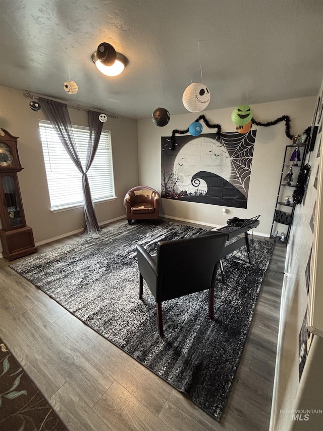 4618 Braeburn, Caldwell, ID 83607 - living area with baseboards and wood finished floors