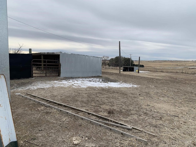 view of outbuilding with a rural view