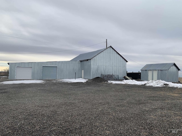 view of outbuilding featuring a garage