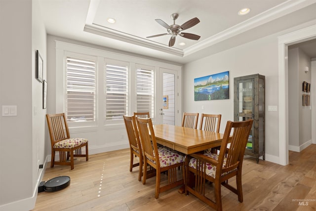 6178 N Bolsena Ln, Meridian, ID 83646 - dining room featuring a ceiling fan, a tray ceiling, recessed lighting, light wood-style flooring, and baseboards