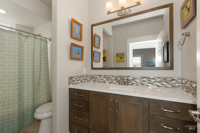 6178 N Bolsena Ln, Meridian, ID 83646 - full bath with vanity, toilet, backsplash, and curtained shower