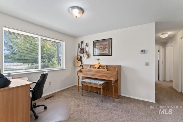 office area with light carpet