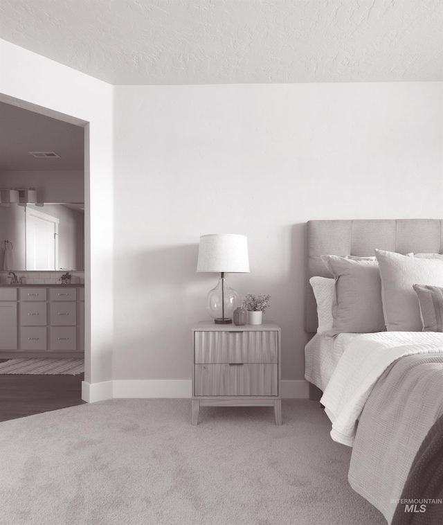 1694 N Solterra Ln, Meridian, ID 83646 - bedroom with baseboards, visible vents, a textured ceiling, and light colored carpet