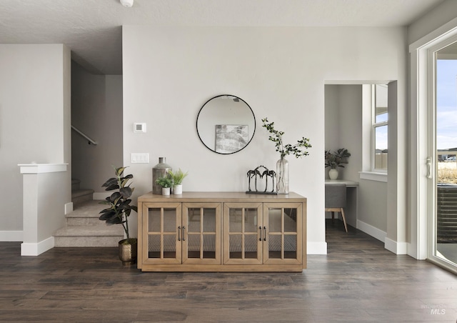 1694 N Solterra Ln, Meridian, ID 83646 - entrance foyer featuring baseboards, wood finished floors, and stairs