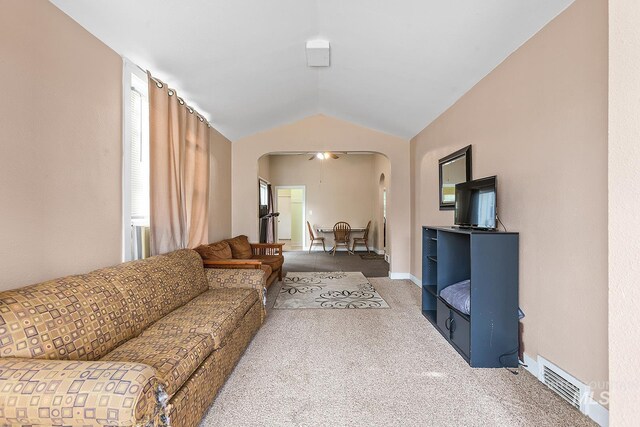 408 6th Ave, Lewiston, ID 83501 - carpeted living area featuring arched walkways and lofted ceiling