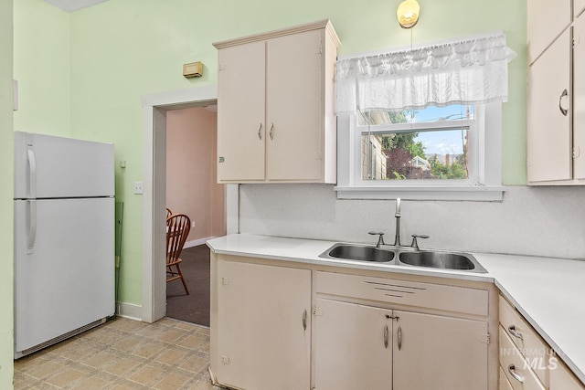 408 6th Ave, Lewiston, ID 83501 - kitchen featuring freestanding refrigerator and light countertops