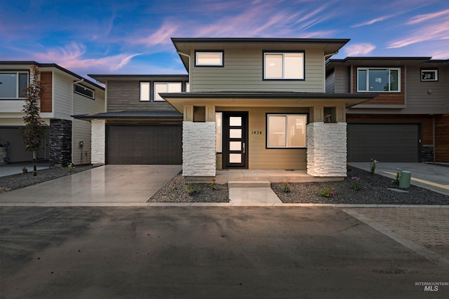 view of front of property featuring a garage