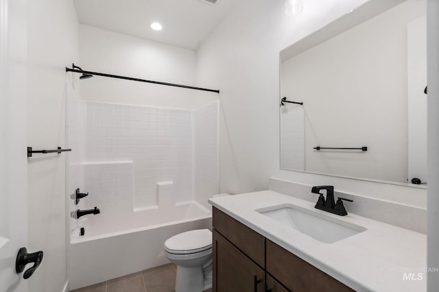 full bath featuring tile patterned flooring, toilet, vanity, and shower / bath combination