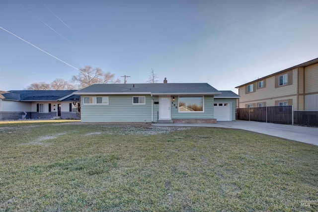 single story home with a garage and a front lawn