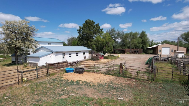 1334 Morehouse Rd, Emmett, ID 83617 - view of yard featuring an outdoor structure, a detached garage, and an exterior structure