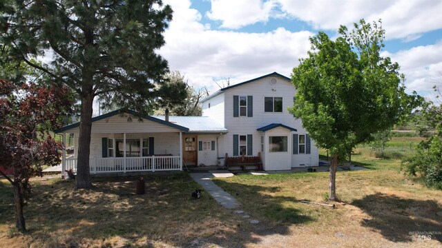 1334 Morehouse Rd, Emmett, ID 83617 - traditional-style home featuring covered porch and a front yard