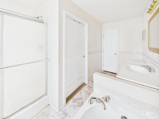 1334 Morehouse Rd, Emmett, ID 83617 - bathroom with a stall shower, a bath, marble look tile flooring, and vanity