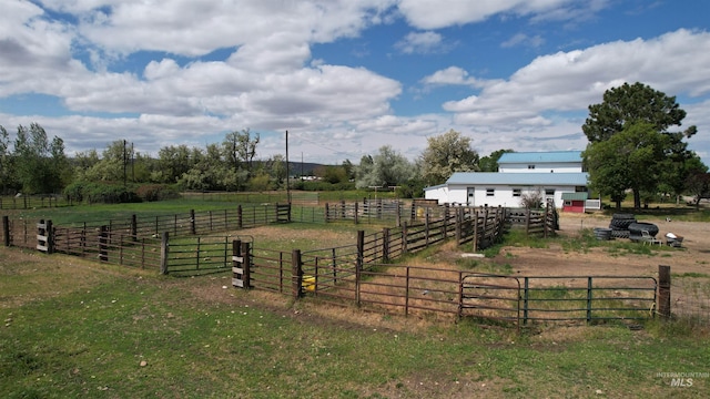 1334 Morehouse Rd, Emmett, ID 83617 - view of grassy yard featuring a view of rural / pastoral area, an outdoor structure, and an exterior structure