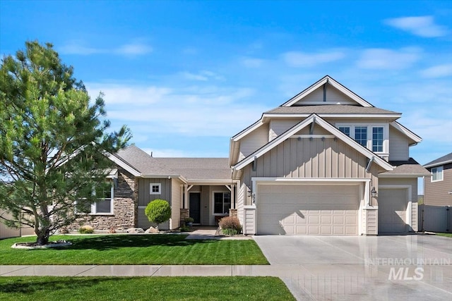 craftsman inspired home featuring board and batten siding, concrete driveway, a front yard, roof with shingles, and an attached garage