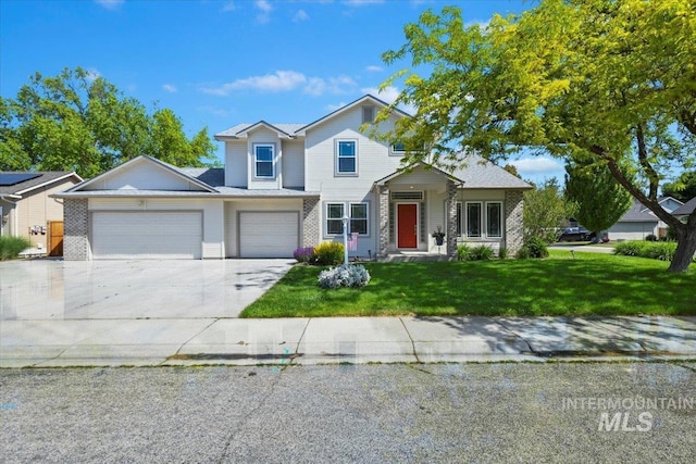 11298 W Charitan St, Boise, ID 83713 - traditional-style house with a front yard, a garage, driveway, and brick siding
