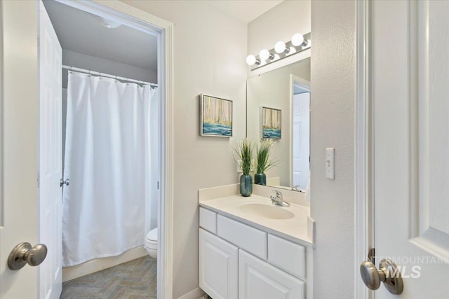 11298 W Charitan St, Boise, ID 83713 - bathroom featuring vanity, toilet, and a shower with shower curtain