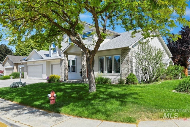 11298 W Charitan St, Boise, ID 83713 - view of property hidden behind natural elements featuring concrete driveway and a front yard