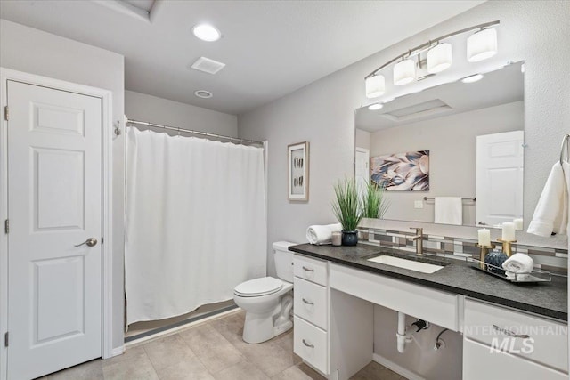 11298 W Charitan St, Boise, ID 83713 - full bathroom featuring vanity, toilet, a shower with shower curtain, and recessed lighting